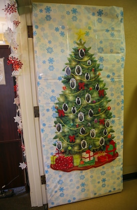 Multiple decorated doors were judged in a contest at Marine Corps Recruit Depot San Diego, Dec. 10. Three judges were chosen to give each door a score based on creativity, visual impact and craftsmanship. The winner of the contest will be announced at the depot Christmas party Dec. 12.