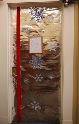 Multiple decorated doors were judged in a contest at Marine Corps Recruit Depot San Diego, Dec. 10. Three judges were chosen to give each door a score based on creativity, visual impact and craftsmanship. The winner of the contest will be announced at the depot Christmas party Dec. 12.