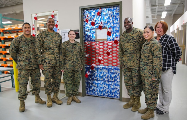 Multiple decorated doors were judged in a contest at Marine Corps Recruit Depot San Diego, Dec. 10. Three judges were chosen to give each door a score based on creativity, visual impact and craftsmanship. The winner of the contest will be announced at the depot Christmas party Dec. 12.