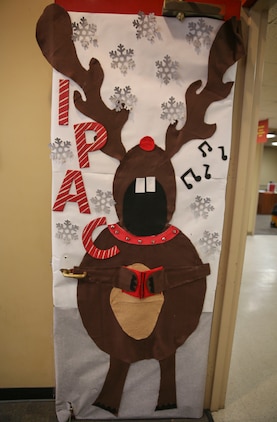 Multiple decorated doors were judged in a contest at Marine Corps Recruit Depot San Diego, Dec. 10. Three judges were chosen to give each door a score based on creativity, visual impact and craftsmanship. The winner of the contest will be announced at the depot Christmas party Dec. 12.