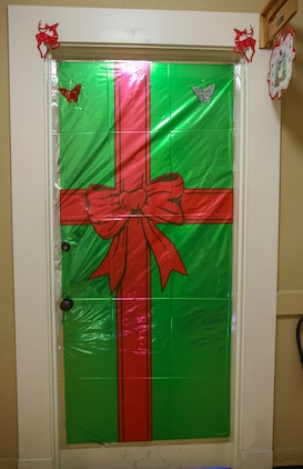Multiple decorated doors were judged in a contest at Marine Corps Recruit Depot San Diego, Dec. 10. Three judges were chosen to give each door a score based on creativity, visual impact and craftsmanship. The winner of the contest will be announced at the depot Christmas party Dec. 12.