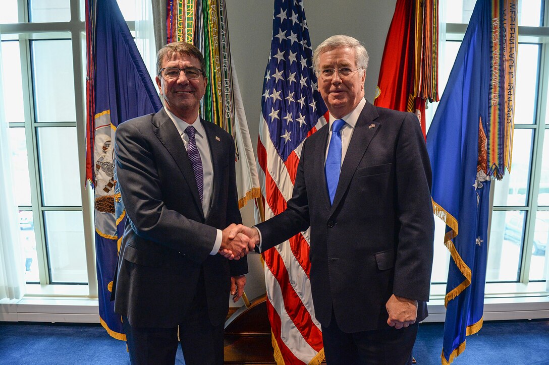 U.S. Defense Secretary Ash Carter and British Defense Secretary Michael Fallon pose for an official photo at the Pentagon, Dec. 11, 2015. DoD photo by U.S. Army Sgt. First Class Clydell Kinchen