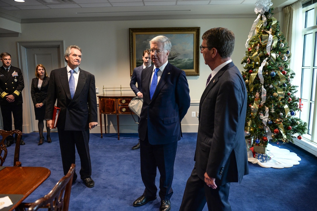 U.S. Defense Secretary Ash Carter and British Defense Secretary Michael Fallon talk before the start of their bilateral meeting at the Pentagon, Dec. 11, 2015. DoD photo by U.S. Army Sgt. First Class Clydell Kinchen