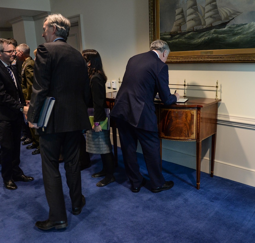 British Defense Secretary Michael Fallon signs the guest book at the Pentagon before meeting with U.S. Secretary of Defense Ash Carter, Dec. 11, 2015. DoD photo by U.S. Army Sgt. First Class Clydell Kinchen
