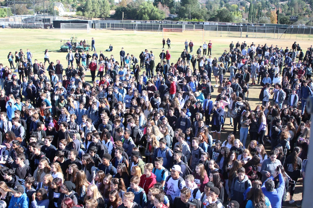 Hundreds of students from Calabasas High School watch some of the world’s top professional skateboarders and BMX bikers during their performances on a state-of-the-art pro half-pipe, while an emcee delivers an anti-bullying and anti-tobacco message, Dec. 11, 2015, as part of the ASA High School Tour. Recruiters from Recruiting Sub Station Granada Hills also attended the event and held a pull-up and flexed-arm hang challenge. (U.S. Marine Corps photo by Staff Sgt. Alicia R. Leaders/Released)  