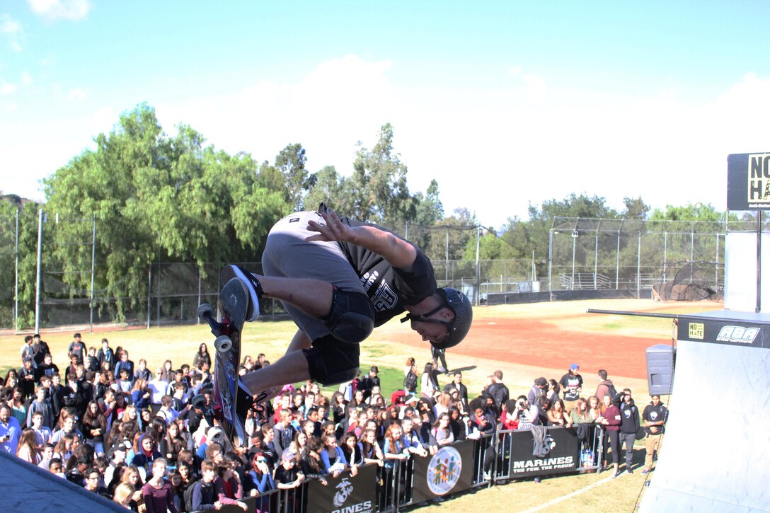 Skateboarder Paul-Luc Ronchetti performs a trick on a state-of-the-art pro half-pipe during the 2015 ASA High School Tour, Dec. 11, at Calabasas High School. The tour is an interactive “extreme” sports show that visits high schools throughout the United States with several of the world’s top professional skateboarders, BMX bikers and inline skaters delivering an anti-bullying and anti-tobacco message. Recruiters from Recruiting Sub Station Granada Hills also attended the event and held a pull-up and flexed-arm hang challenge. (U.S. Marine Corps photo by Staff Sgt. Alicia R. Leaders/Released)
