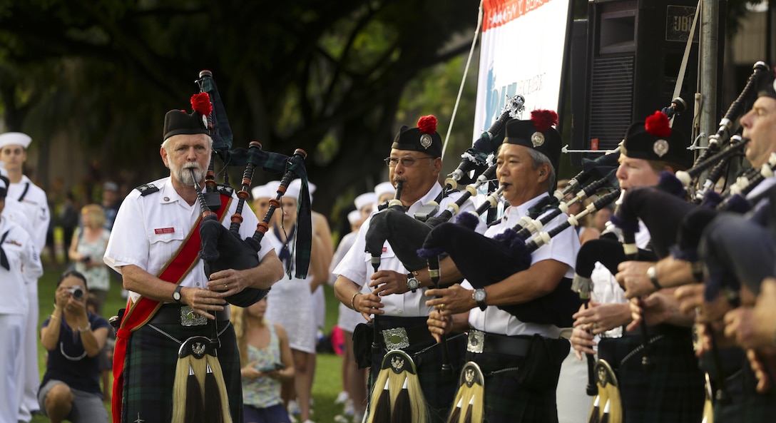 Pipe major Dan Quinn leads members of the Celtic Pipes & Drums of Hawaii during the opening ceremony of the Pearl Harbor Memorial Parade at Fort DeRussy Park in Honolulu, Dec. 7, 2015. U.S. Marine Corps photo by Lance Cpl. Miguel Rosales