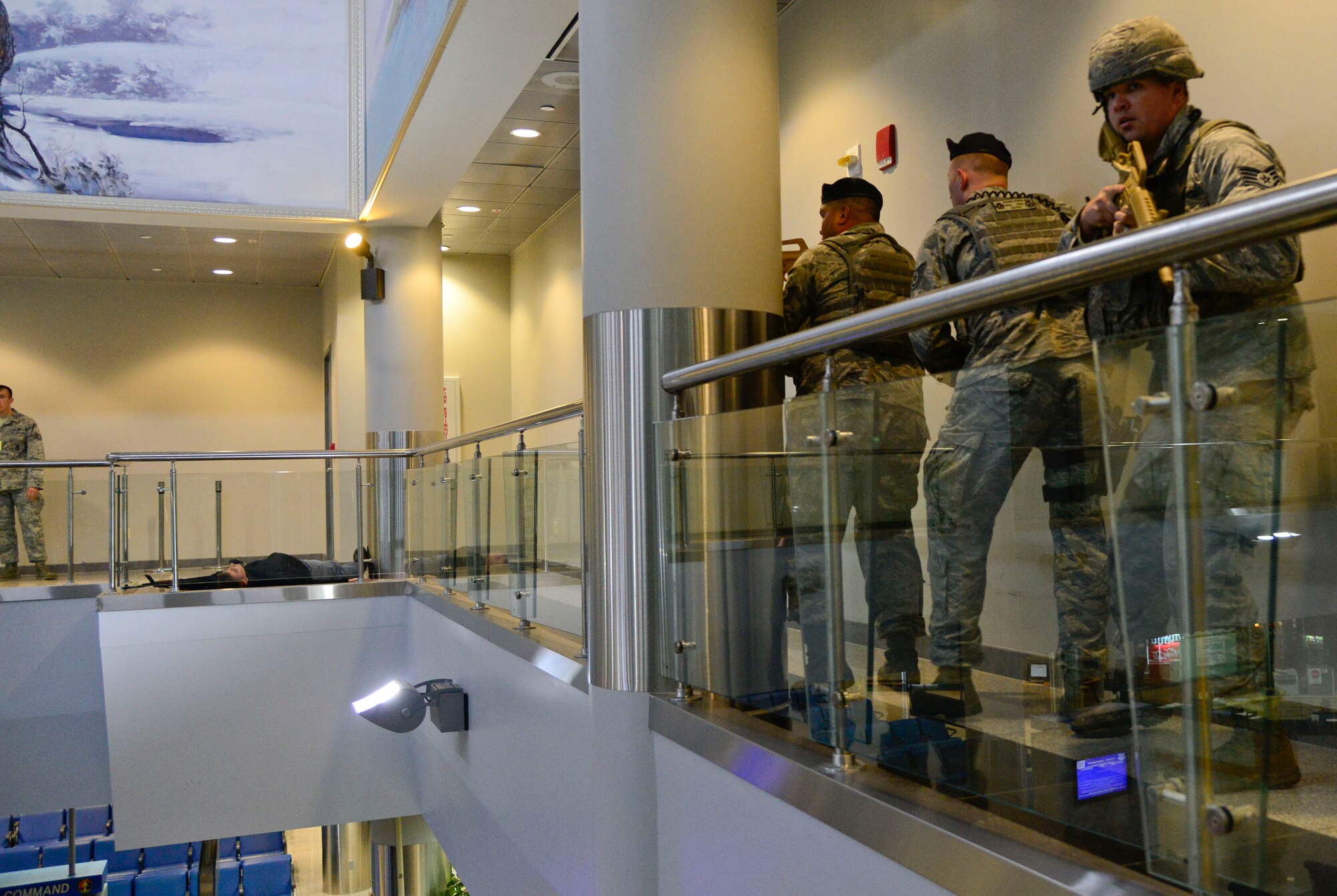 Defenders from the 51st Security Forces Squadron search for an active-shooter during an internal exercise on Osan Air Base, Republic of Korea, Dec. 10, 2015. The defenders keep multiple members on teams during these incidents to ensure all sides are covered and minimize the risk of injury. (U.S. Air Force photo/Senior Airman Kristin High)