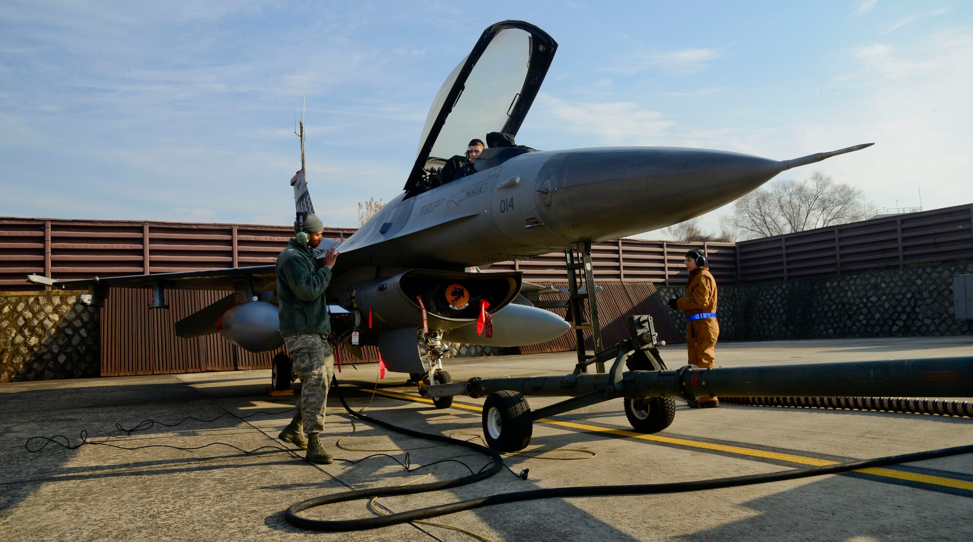 Airmen from the 51st Maintenance Squadron aircraft fuels systems repair shop check the external tank vent and pressure system on an F-16 Fighting Falcon, on Osan Air Base, Republic of Korea, Dec. 9, 2015. The Airmen from the shop are responsible for a multitude of processes including working in-and-out of fuel tanks to remove, repair, inspect, install and modify aircraft fuel systems; diagnosing component malfunctions and performing maintenance on the tanks themselves. (U.S. Air Force photo/Senior Airman Kristin High)