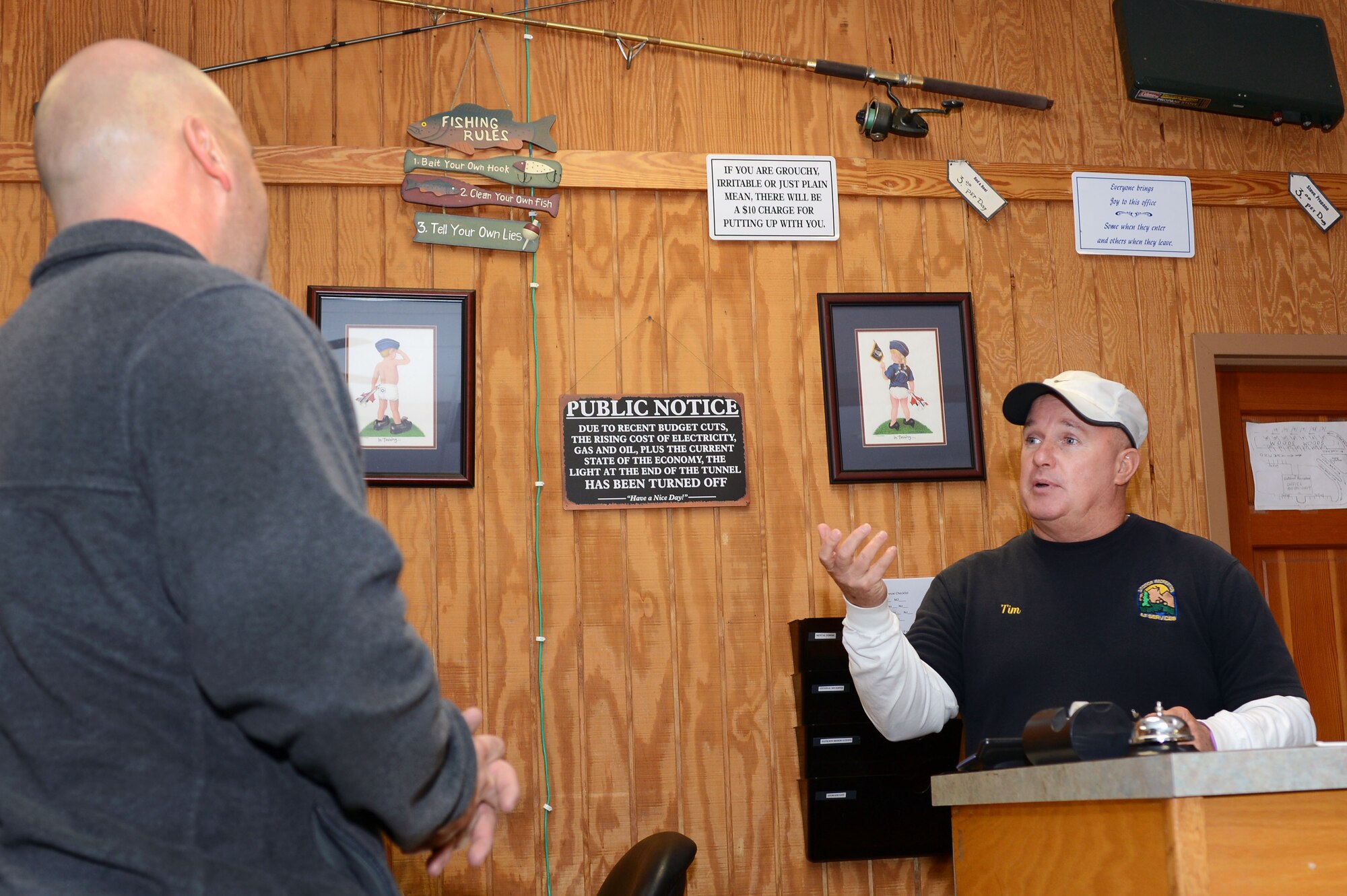 Tim Godwin, 20th Force Support Squadron Outdoor Recreation director, provides camping advice to a customer at Shaw Air Force Base, S.C., Dec. 11, 2015. Outdoor Recreation operates the Falcon’s Nest FamCamp, the Shaw skeet and trap range, and the base picnic grounds and pools. They also provide guided trips, events, classes and a wide variety of recreational activities to military personnel, their dependents, Department of Defense civilians, and retirees. (U.S. Air Force photo by Senior Airman Zade Vadnais)