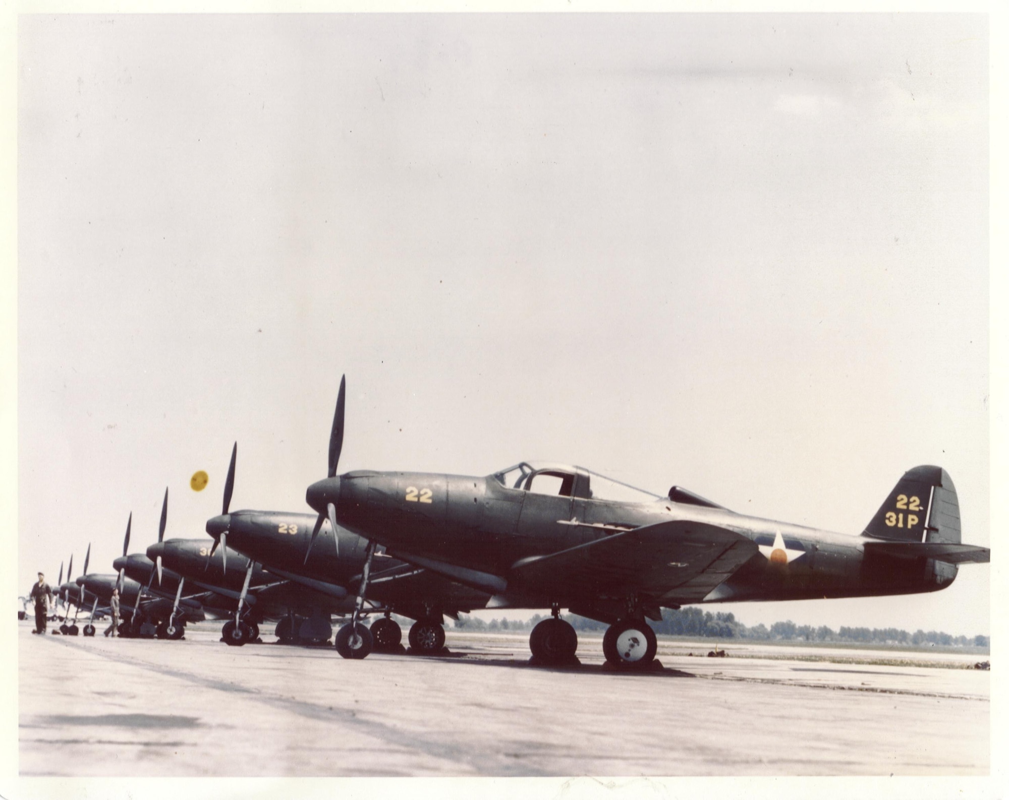 Poised on the flightline are P-39s  from the 33rd Fighter Group at Mitchel Field, N.Y., circa 1941. The 33rd FG belonged to First Air Force from Jan. 16, 1941 to March 21, 1942..