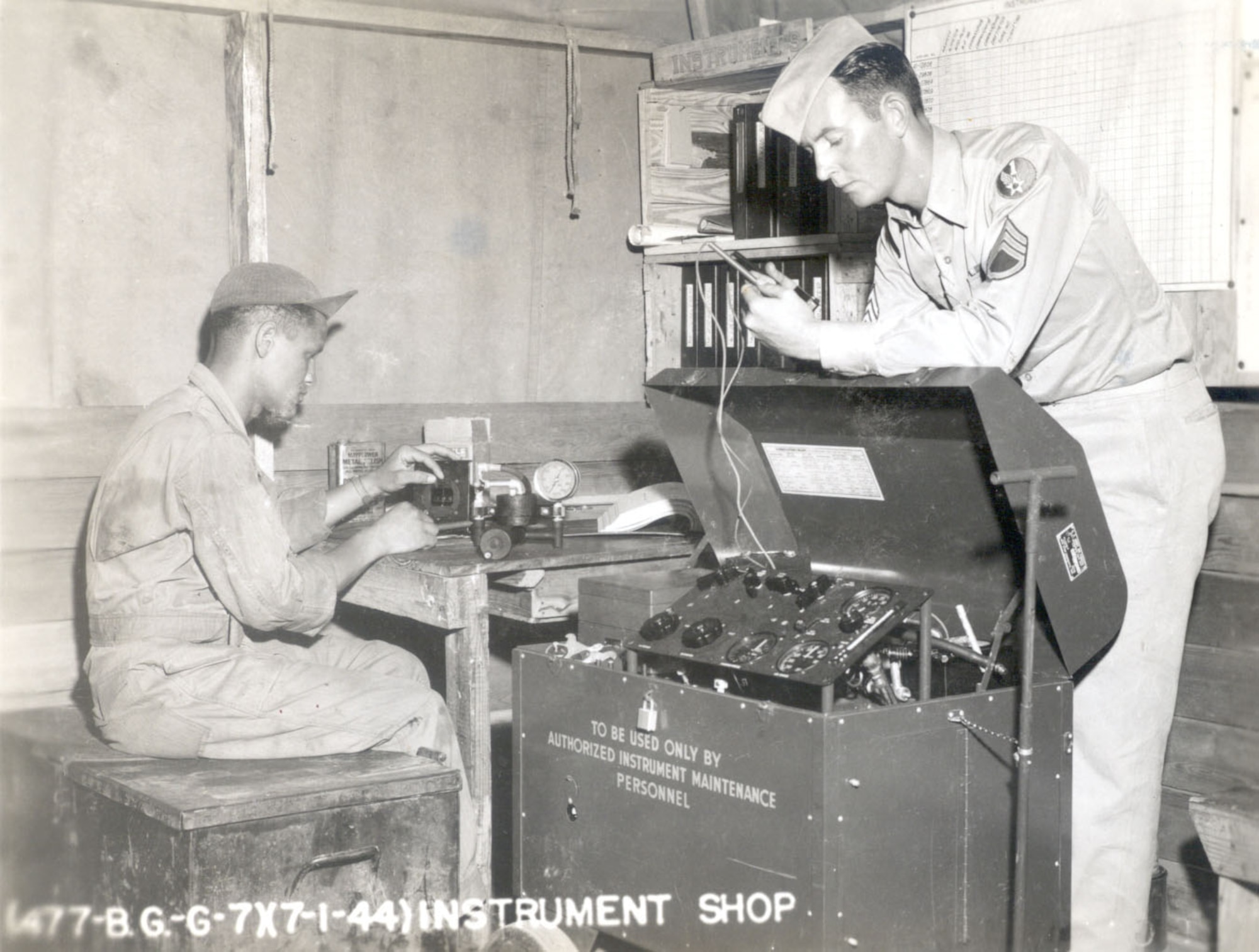 A member of the 447th Bombardment Group (Medium) receives on-the-job training of aircraft instrumentation at Godman Field, Fort Knox, Kent., in July 1944. The 447th BG was assigned to First Air Force from April 10, 1944 to March 21, 1946.