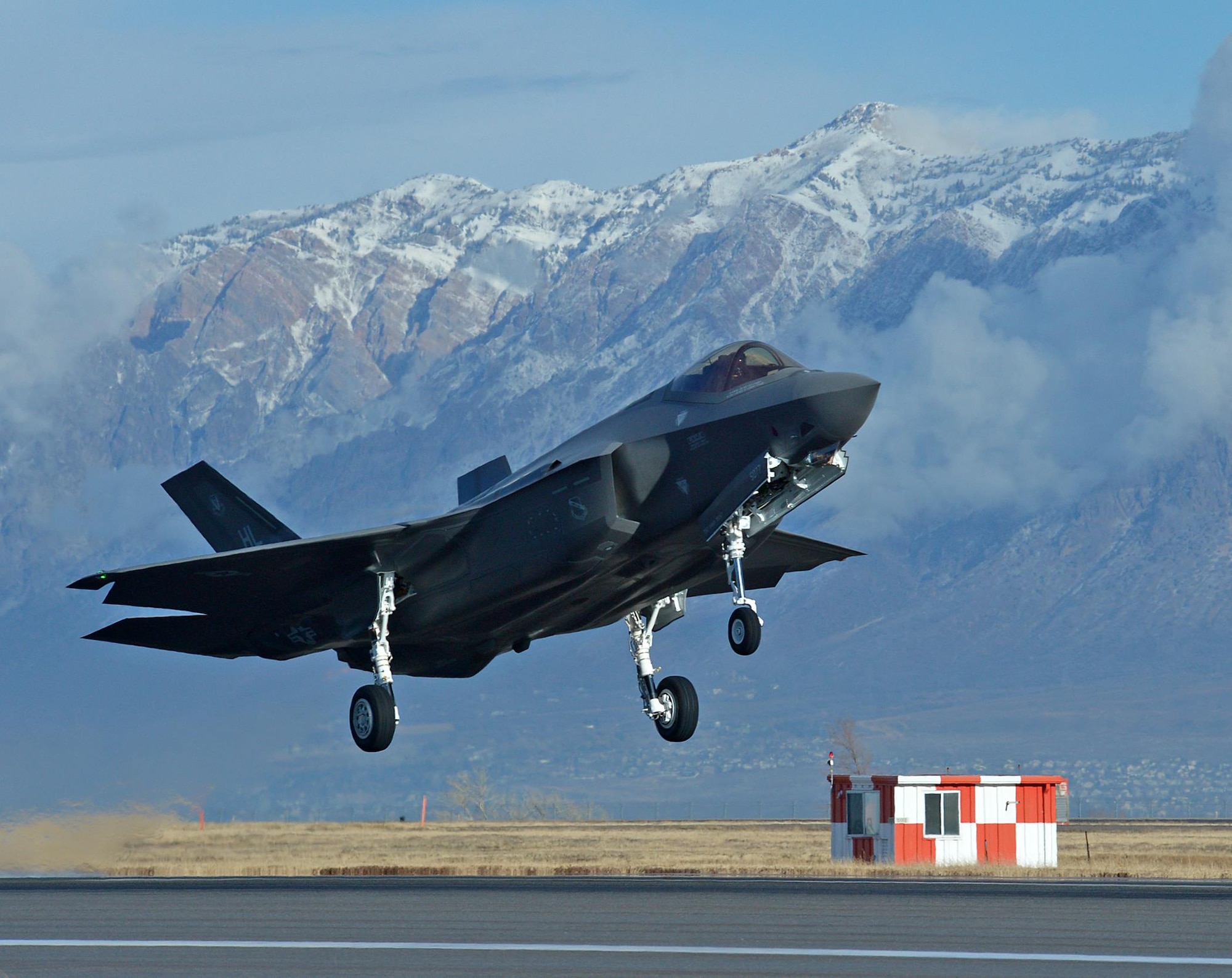 Maj. Jayson Rickard, a reservist in the 466th Fighter Squadron, takes off for his first local sortie in the F-35 Lightning II at Hill Air Force Base today. Rickard's flight marks the 100th sortie in the F-35 at Hill since the first combat-coded aircraft arrived in September. In the
three months since the first F-35s arrived at Hill, only two of 129 scheduled sorties were lost due to maintenance issues. Initially, the 34th Aircraft Maintenance Unit went 33 sorties without losing a line for maintenance. Together, the active-duty 388th Fighter Wing and Air Force Reserve 419th Fighter Wing are working toward F-35 initial operational capability, or IOC, by fall of 2016. (U.S. Air Force photo/Alex Lloyd)

