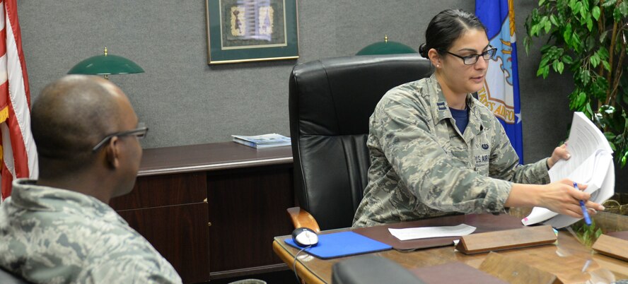 Captain Amanda Barreto, the 49th Wing legal assistance and preventive law chief of operations, prepares to have a one-on-one with an Airman during the Legal Hawk Outreach Program visit to the 49th Material Maintenance Support Squadron at Holloman Air Force Base, New Mexico on Dec. 4. The legal office recently cut back the number of walk-in legal assistance appointments due to manning issues. The outreach program was created to provide quality legal assistance to those who were having difficulty making it to the legal office. (U.S. Air Force photo by Staff Sgt. E’Lysia A. Wray)