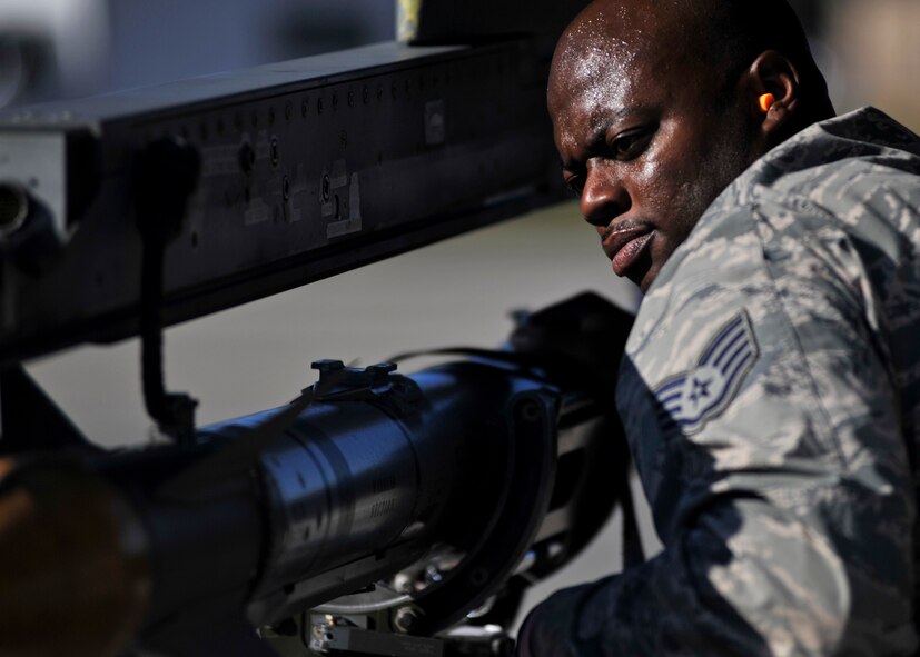 An aircraft armament staff sergeant with the 77th Aircraft Maintanance Unit, Shaw Air Force Base, S.C. begins to unload a missile Dec. 8 at the Tyndall flightline. Airmen from Shaw AFB were at Tyndall for the Weapons System Evaluation Program and Checkered Flag 16-1. (U.S. Air Force photo by Senior Airman Sergio A. Gamboa/Released)