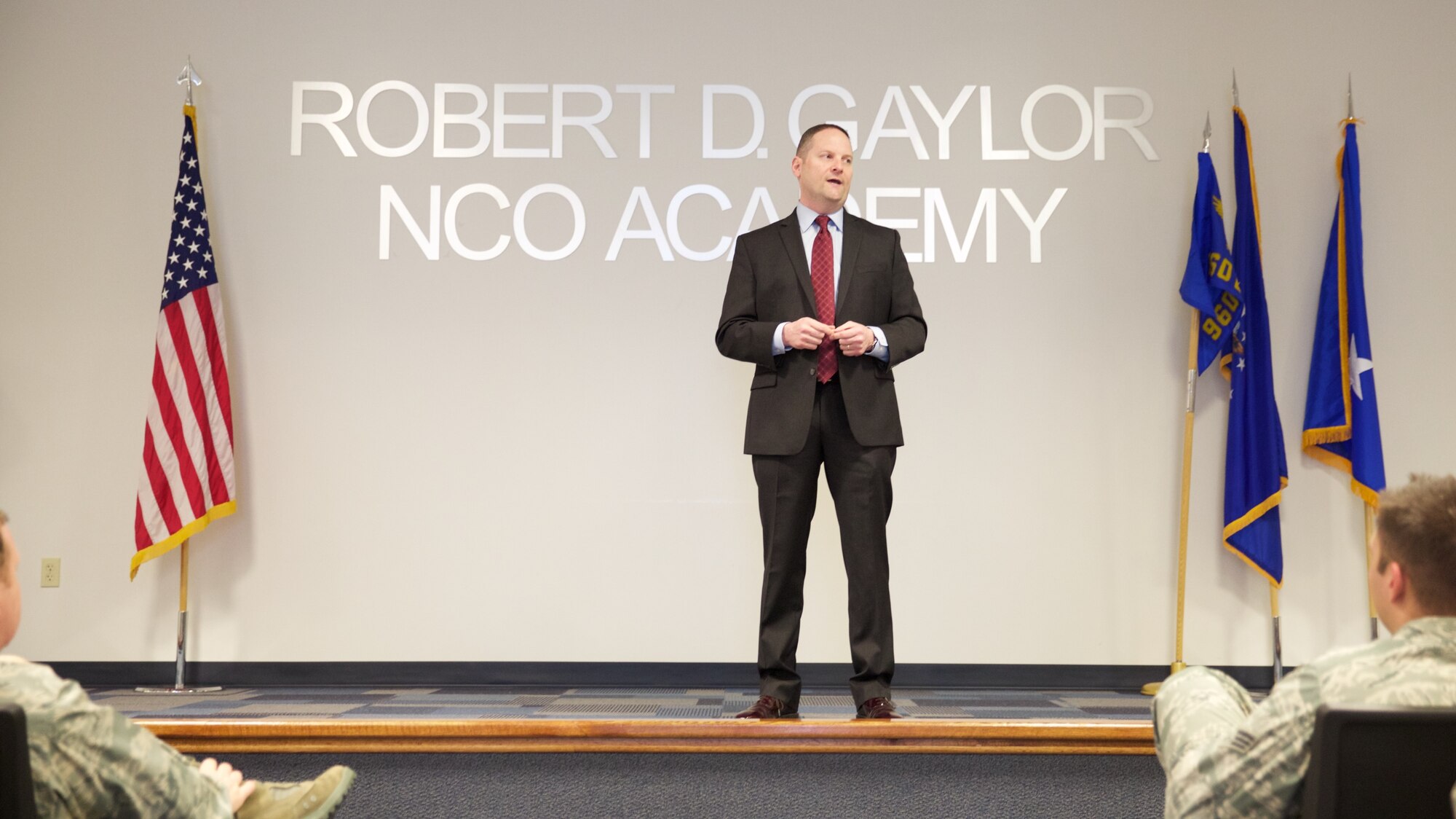 David Neuman, 960th Cyberspace Operations Group honorary commander, addresses a crowd of approximately 125 Citizen Airmen after being inducted an honorary commander Dec. 5 at the Robert D. Gaylor NCO Academy Auditorium. Neuman is the Senior Director of Information Security Operations at Rackspace Headquarters here in San Antonio, Texas. (U.S. Air Force Photo/Tech. Sgt. Miguel Naranjo) 
