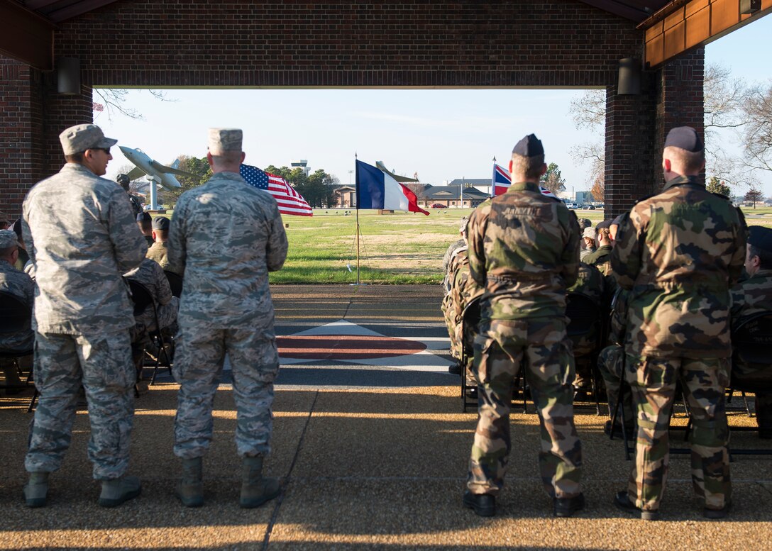 Approximately 80 Service members from the U.S. Air Force, British Royal Air Force and French air force gathered for a wreath-laying ceremony at Langley Air Force Base, Va., Dec. 11, 2015. The ceremony was held in remembrance of the victims of recent terrorist attacks in Paris, France. (U.S. Air Force photo by Airman 1st Class Derek Seifert)