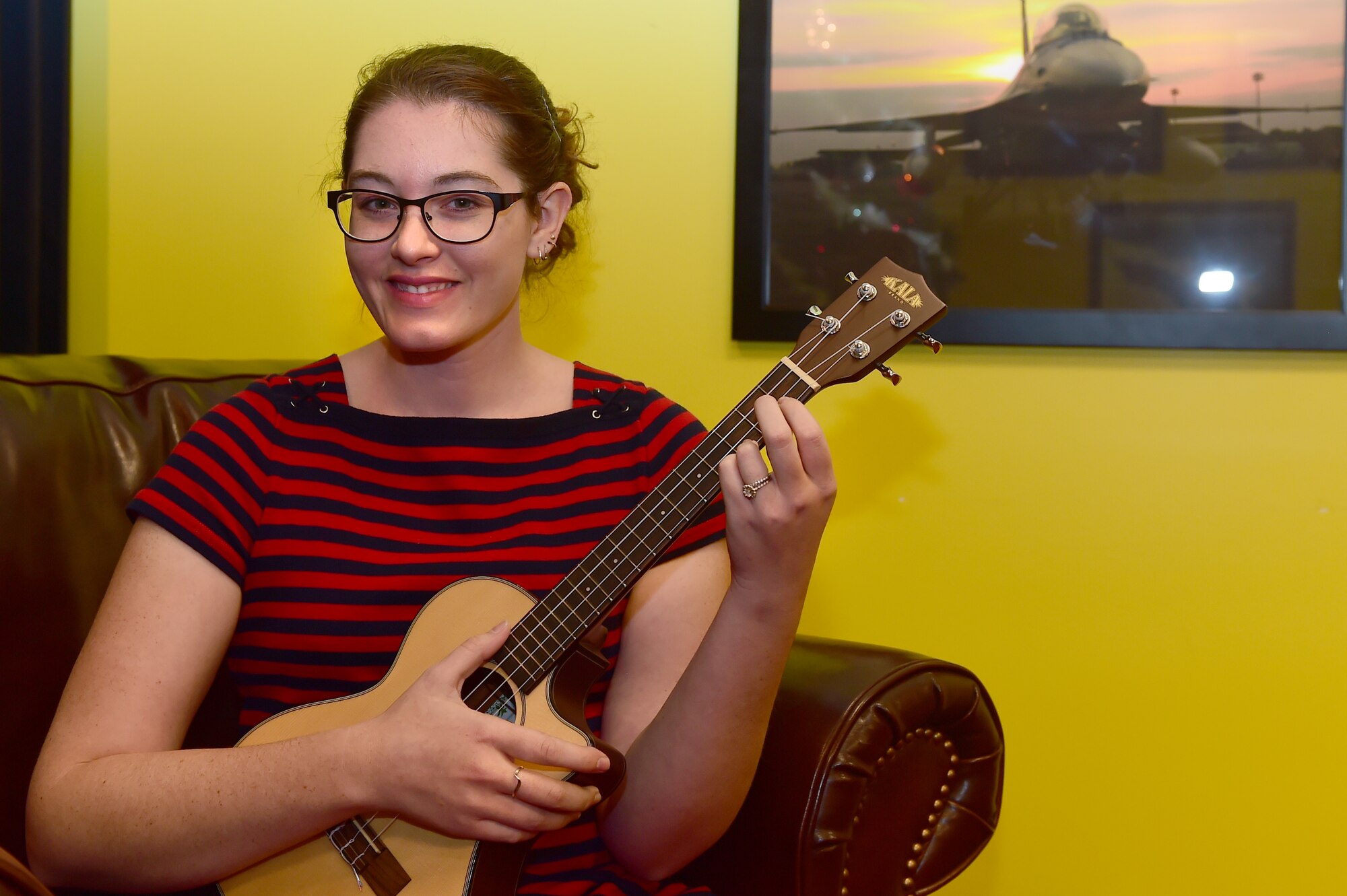 Mandy Harvey poses for a photograph Dec. 10, 2015, at the Panther Den on Buckley Air Force Base, Colo. Harvey is an accomplished singer/songwriter who is hearing impaired. She performed at Buckley AFB in honor of National Disability Employment Awareness Month. (U.S. Air Force photo by Airman 1st Class Luke W. Nowakowski/Released)