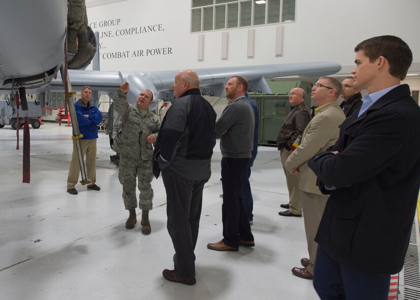 A group of 16 aviation professionals from across the country visiting Gowen Field and learning about the 124th Fighter Wing facilities, equipment, and capabilities during a tour on Dec. 8, 2015. The group includes military leaders, federal officials, industry colleagues and other aviation professionals from New Hampshire, Texas, Oklahoma, Washington, Idaho and more. They assembled in Boise to attend the Industrial Aviation Military/Civilian Joint Use Issues Training Workshop by the American Association of Airport Executives created to discuss the latest regulations, technologies and issues concerning military/civilian airfield operations and the growing area of industrial aviation. (U.S. Air National Guard photo by Tech. Sgt. Sarah Pokorney/RELEASED)