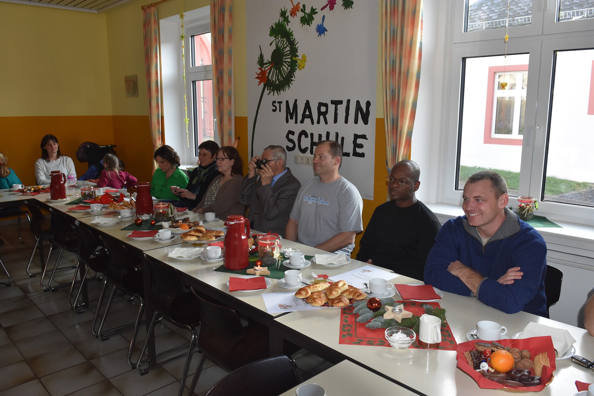 A delegation from Spangdahlem Air Base consisting of Airmen, spouses and civilians joined school officials, teachers, parents and students at the Bitburg Saint Martin School for their annual Sankt Nikolaus holiday celebration Dec. 7. (U.S. Air Force photo by Iris Reiff/Released)