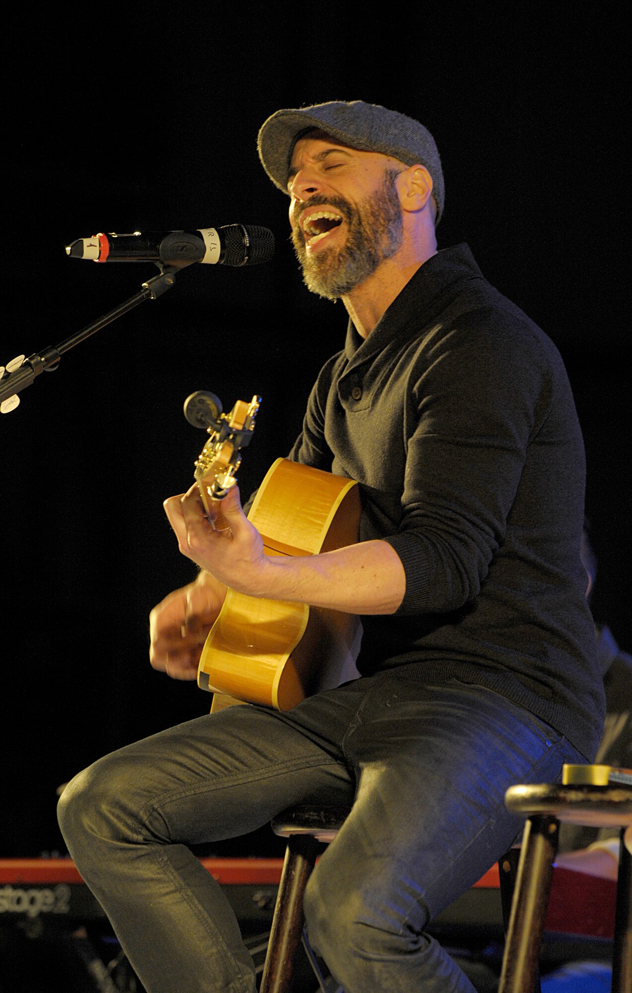 Musician Chris Daughtry performs during the 2015 USO Holiday Troop Tour Dec. 9, 2015, at Ramstein Air Base, Germany. Daughtry and other celebrities joined U.S. Marine Corps Gen. Joseph F. Dunford, chairman of the Joint Chiefs of Staff, for the 15th annual tour to thank service members and their families for their service and sacrifices. (U.S. Air Force photo/Staff Sgt. Timothy Moore)