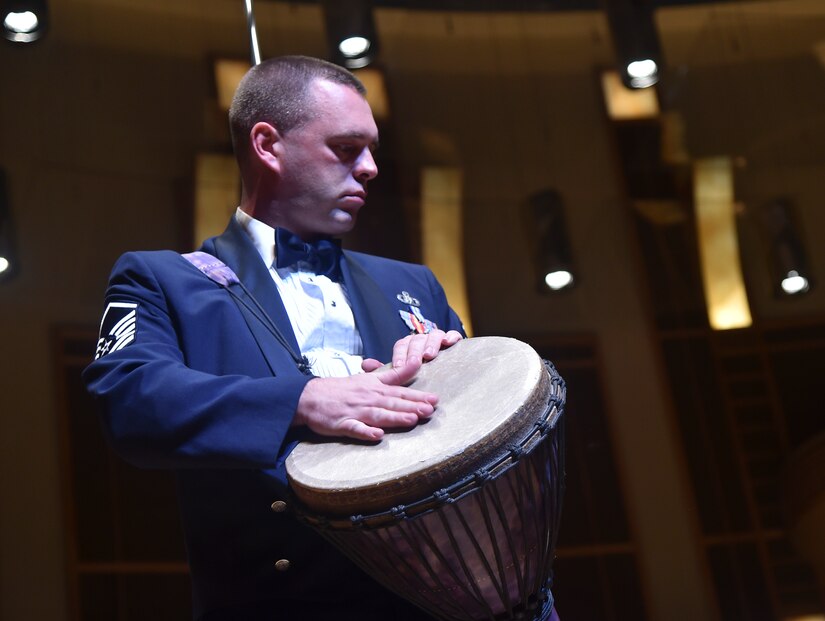 Master Sgt. Eric Sullivan, U.S. Air Force Band member, plays percussion with Celtic Aire during a performance at the Strathmore Theatre in Bethesda, Md., Dec 1, 2015. The Air Force Band is the Air Force’s premier musical organization. The excellence demonstrated by the Band’s Airmen is a reflection of the excellence carried out 24 hours a day by Airmen stationed around the globe. (U.S. Air Force photo/ Airman 1st Class J.D. Maidens/ released)