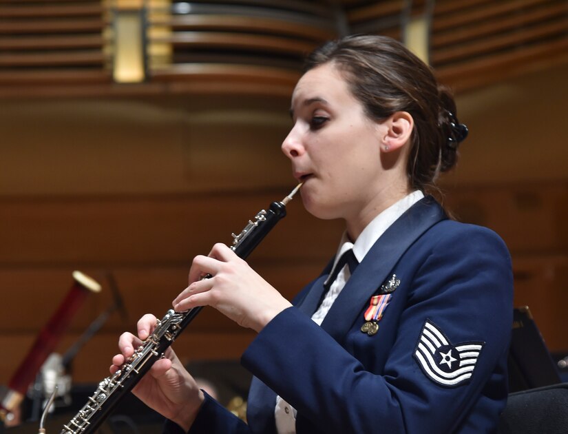 Tech. Sgt. Emily Snyder, U.S. Air Force Concert Band member, plays oboe during a Concert Band performance at the Strathmore Theatre in Bethesda, Md., Dec 1, 2015. The Air Force Band is the Air Force’s premier musical organization. The excellence demonstrated by the Band’s Airmen is a reflection of the excellence carried out 24 hours a day by Airmen stationed around the globe. (U.S. Air Force photo/ Airman 1st Class J.D. Maidens/ released)