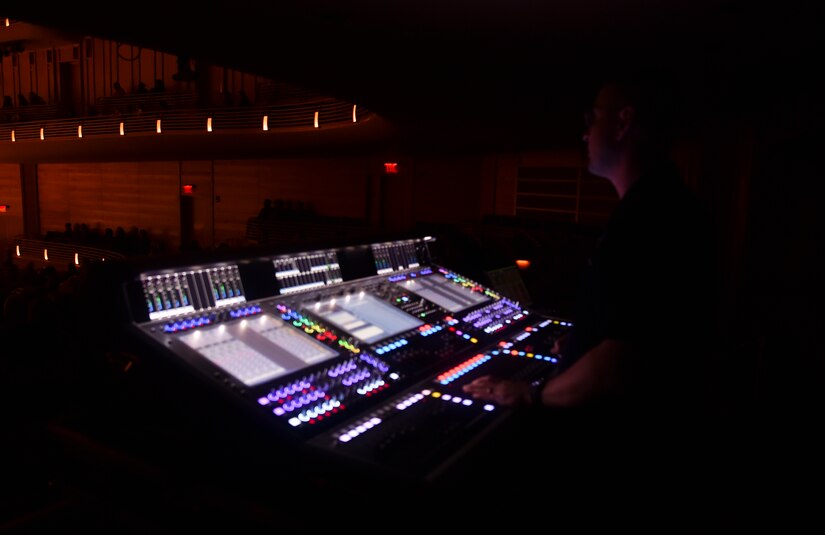 Master Sgt. Loren Zimmer, U.S. Air Force Band audio engineer, works with the technical aspects of the band’s sound during their performance at the Strathmore Theatre in Bethesda, Md., Dec 1, 2015. The Air Force Band is the Air Force’s premier musical organization. The excellence demonstrated by the Band’s Airmen is a reflection of the excellence carried out 24 hours a day by Airmen stationed around the globe. (U.S. Air Force photo/ Airman 1st Class J.D. Maidens/ released)