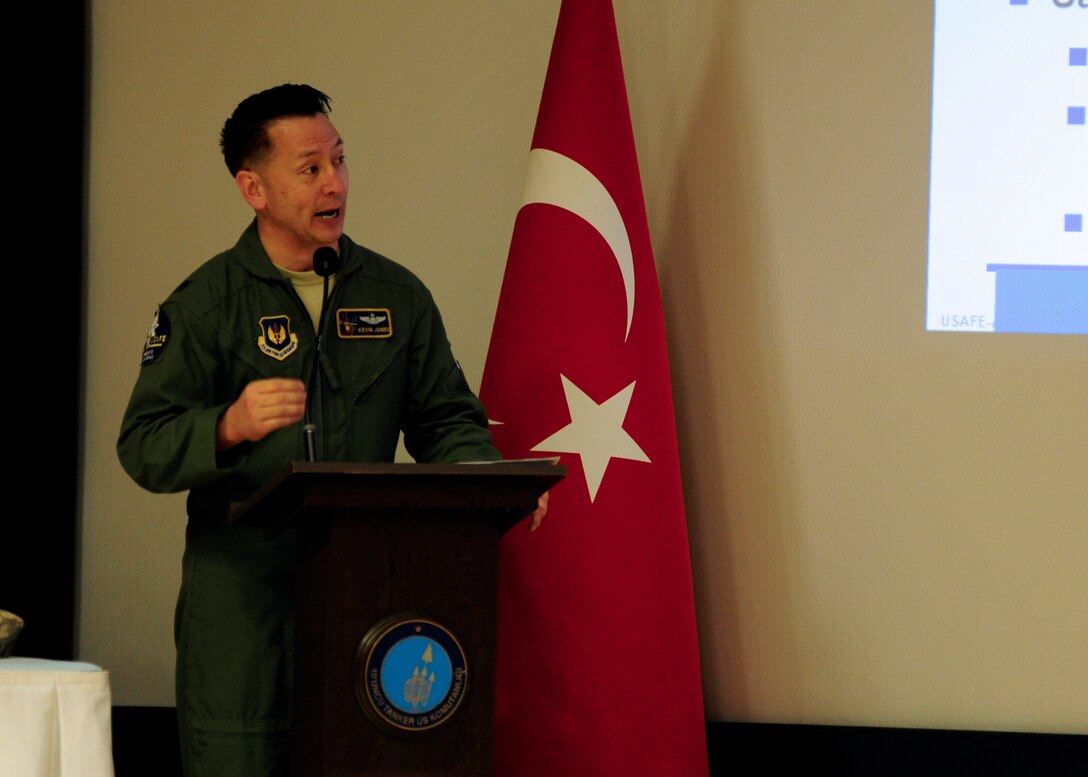 Lt. Col. Kevin Jones, Headquarter U.S. Air Forces in Europe Air Forces Africa aviation safety division chief, gives a speech during a safety meeting Dec. 8, 2015, at Incirlik Air Base, Turkey. The annual event brought together personnel from the U.S. Air Force, the Turkish air force and the Qatar Emiri air force to discuss flight and ground safety trends and procedures. (U.S. Air Force photo by Senior Airman Krystal Ardrey/Released)