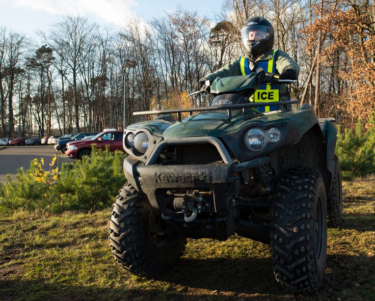 Senior Airman Devin Wilson, 86th Security Forces Squadron patrolman, sits on an all-terrain vehicle before beginning his patrol Dec. 9, 2015, at Ramstein Air Base, Germany. The 86th Airlift Wing Anti-terrorism office works hand-in-hand with security forces to determine the measure of protection to be utilized on base at any given time. (U.S. Air Force photo/Airman 1st Class Tryphena Mayhugh)