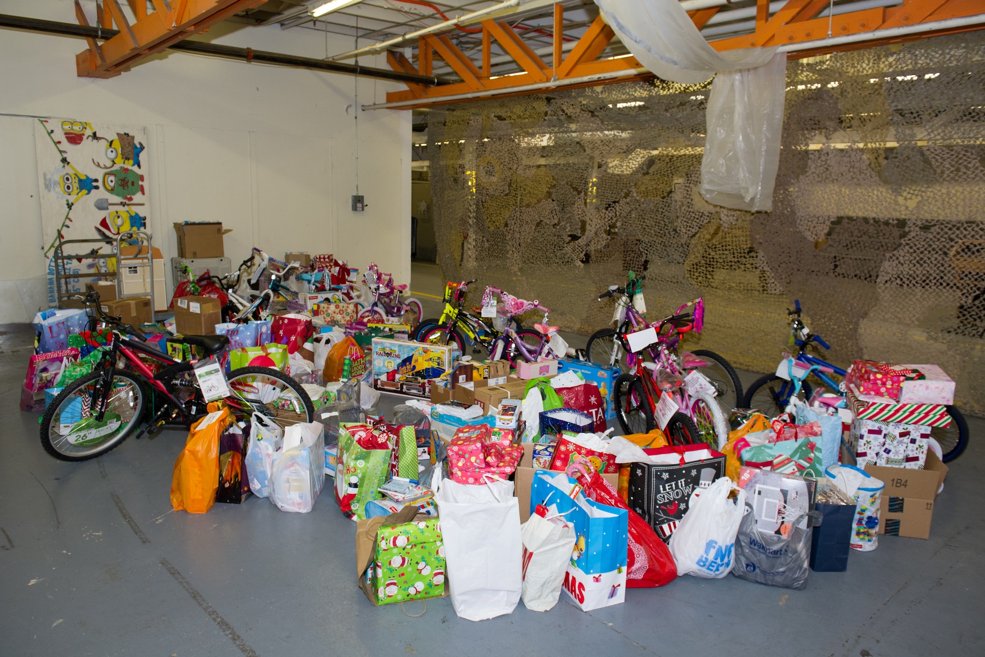 The Patrick AFB and Cape Canaveral AFS First Sergeant's Council collected more than 600 toys, and donated to the Brevard Family Partnership for an annual toy drive in support of children in foster care, Dec. 8, 2015, at Patrick Air Force Base, Fla. Each year, the Brevard Family Partnership relies on numerous organizations and companies to support the event, which made for a total estimate value of $8,000. (U.S. Air Force photo/Benjamin Thacker) (Released) 
