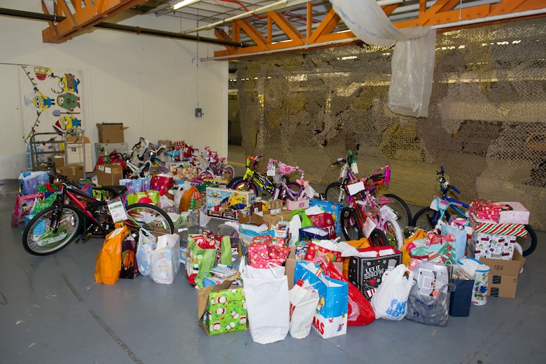 The Patrick AFB and Cape Canaveral AFS First Sergeant's Council collected more than 600 toys, and donated to the Brevard Family Partnership for an annual toy drive in support of children in foster care, Dec. 8, 2015, at Patrick Air Force Base, Fla. Each year, the Brevard Family Partnership relies on numerous organizations and companies to support the event, which made for a total estimate value of $8,000. (U.S. Air Force photo/Benjamin Thacker) (Released) 