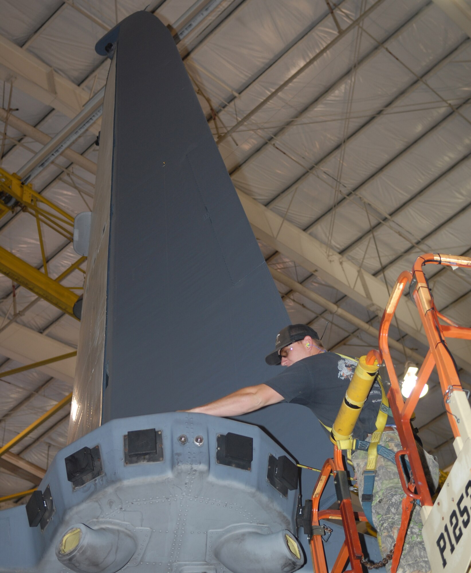 Patrick Petroski, 560th Aircraft Maintenance Squadron, conducts an operational check on the travel rudder of an AC-130.  (U.S. Air Force photo by Misuzu Allen)