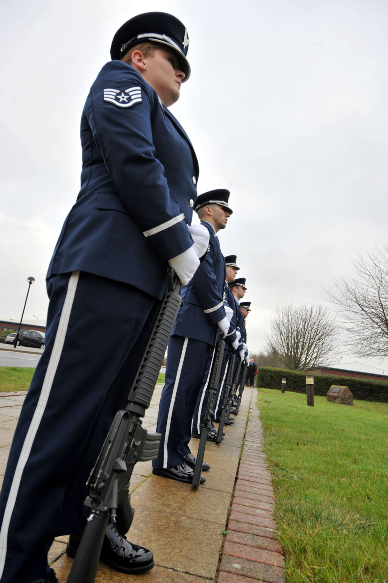 The 423rd Air Base Group Honor Guard stand at parade rest during the 74th Pearl Harbor Commemoration Ceremony at RAF Molesworth, United kingdom, Dec. 7, 2015. The ceremony included a wreath laying to honor the fallen as well as a special guest speaker, Pearl Harbor survivor, former U.S. Marine Corps Sgt. Jogn Egan. (U.S. Air Force photo by Staff Sgt. Ashley Tyler/Released)