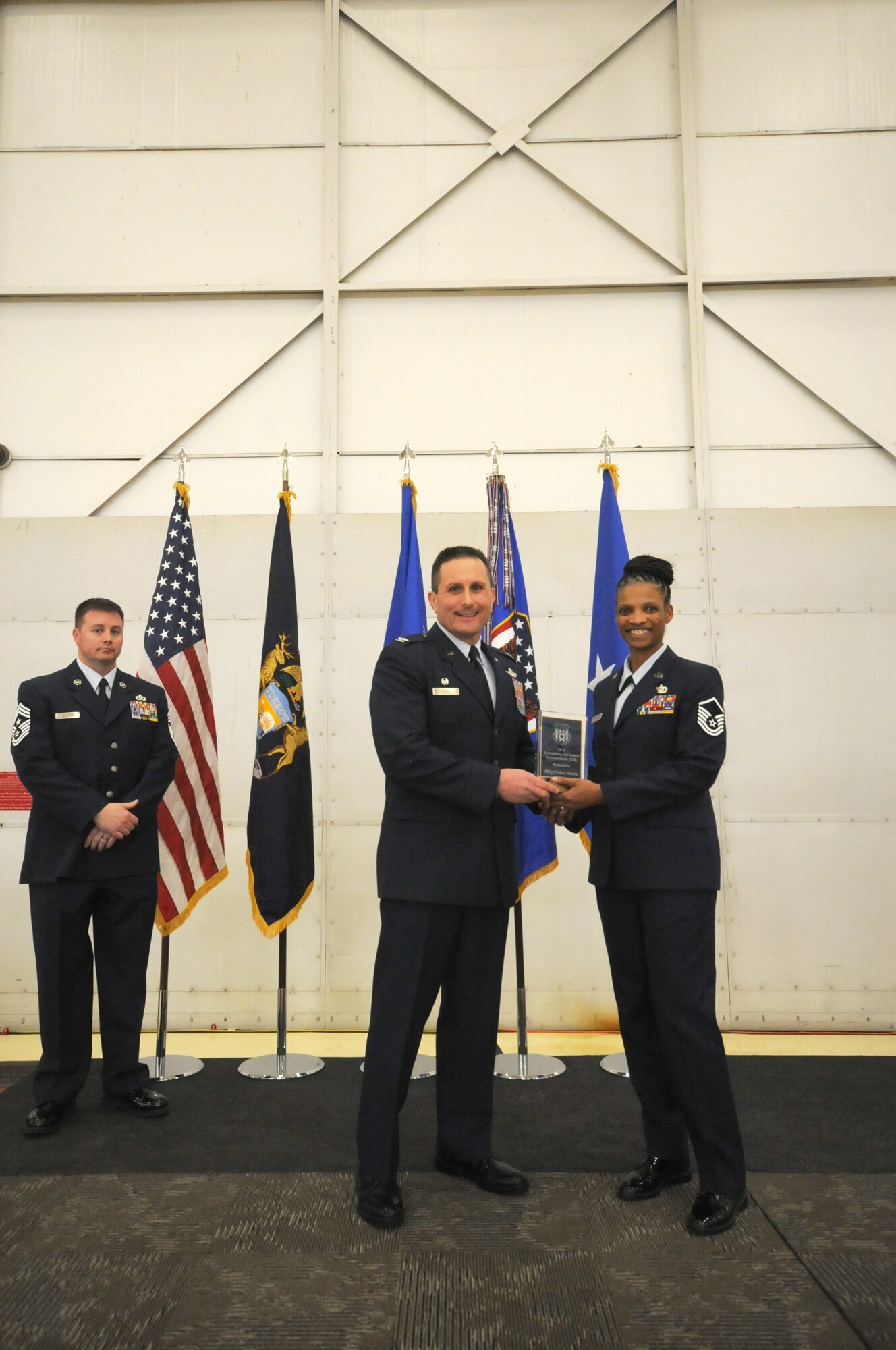 Col. Bryan Teff announces and congratulates the 2015 Airman of the Year recipients, Saturday, December 5, 2015, Battle Creek Air National Guard Base, Mich. Members awarded include, Airman of the Year, Senior Airman Erik Elliot, 110th Operations Support Squadron, Non-Commissioned Officer of Year, Tech. Sgt. Richard Parker II, 217th Air Component Operations Squadron, Senior Non-Commissioned Officer of the Year, Master Sgt. Carl Westphal II, 217th Air Operations Squadron, Company Grade Officer of the Year, 1st Lt. Justin Andrews, 217th Air Component Operations Squadron, 1st Sgt. of the Year, Master Sgt. Darrell Kingsbury, 217th Air Operations Group, Honor Guard Member of the Year, Staff Sgt. Amanda Bean, Battle Creek Air National Guard Enlisted Memorial Scholarship recipient, Jacob Zahm, annual 110th Attack Wing Outstanding Unit Safety Representative, Master Sgt. Felica Harris, and Outstanding Individual Safety Contribution, Master Sgt. Luke Wimby, and 110th Attack Wing Guardsman of the year, Staff Sgt. Amanda Bean. (Air National Guard Photo by Master Sgt. Sonia Pawloski/released)