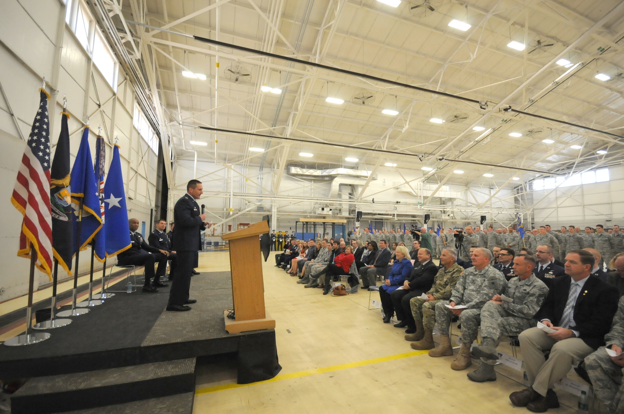 Col. Bryan Teff assumes command of the 110th Attack Wing, Battle Creek Air National Guard Base, Mich., Saturday, December 5, 2015 in the hangar of the Wing. Teff will be taking over the role of commander from Col. Ronald Wilson who has been the wing commander for three years. (Air National Guard Photo by Master Sgt. Sonia Pawloski/released)