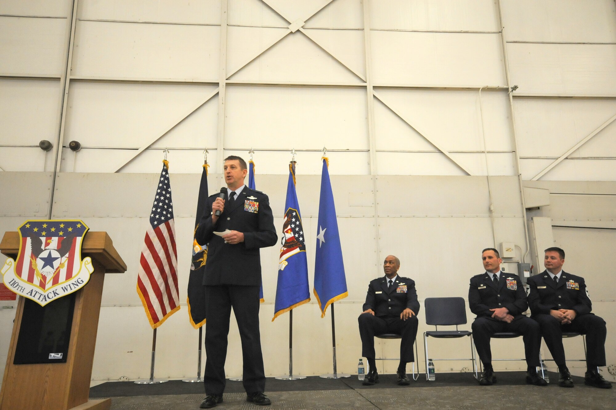 Col. Bryan Teff assumes command of the 110th Attack Wing, Battle Creek Air National Guard Base, Mich., Saturday, December 5, 2015 in the hangar of the Wing. Teff will be taking over the role of commander from Col. Ronald Wilson who has been the wing commander for three years. (Air National Guard Photo by Master Sgt. Sonia Pawloski/released)