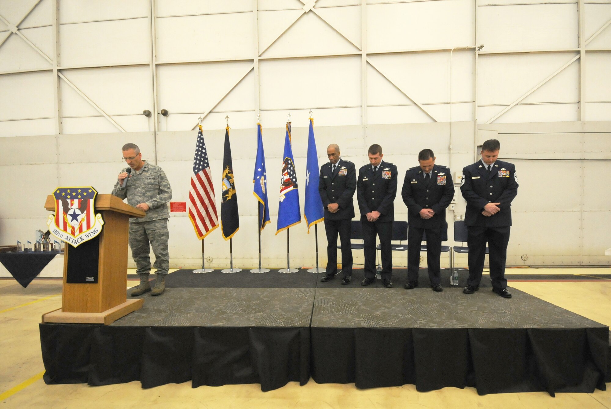 Col. Bryan Teff assumes command of the 110th Attack Wing, Battle Creek Air National Guard Base, Mich., Saturday, December 5, 2015 in the hangar of the Wing. Teff will be taking over the role of commander from Col. Ronald Wilson who has been the wing commander for three years. (Air National Guard Photo by Master Sgt. Sonia Pawloski/released)