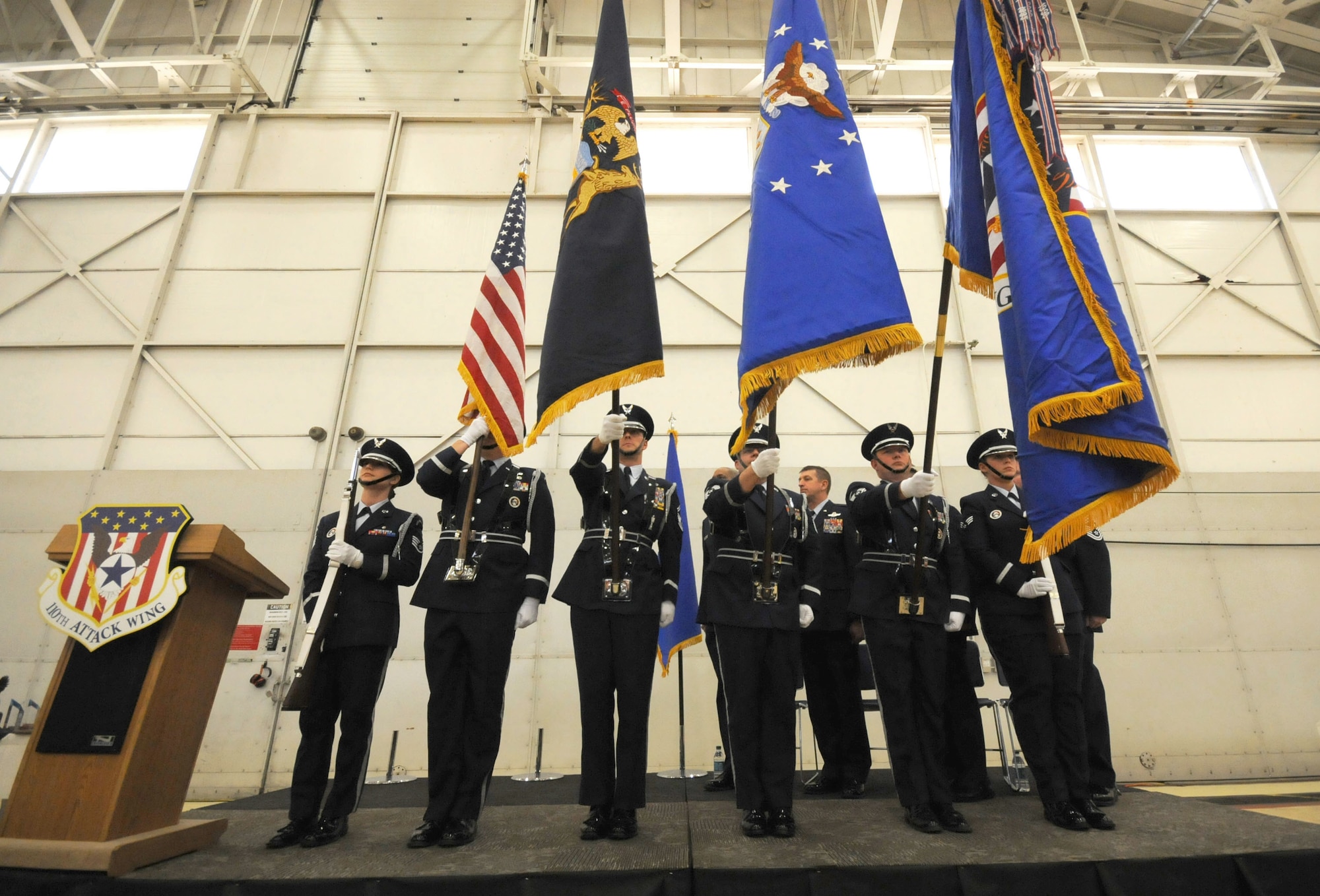 Col. Bryan Teff assumes command of the 110th Attack Wing, Battle Creek Air National Guard Base, Mich., Saturday, December 5, 2015 in the hangar of the Wing. Teff will be taking over the role of commander from Col. Ronald Wilson who has been the wing commander for three years. (Air National Guard Photo by Master Sgt. Sonia Pawloski/released)