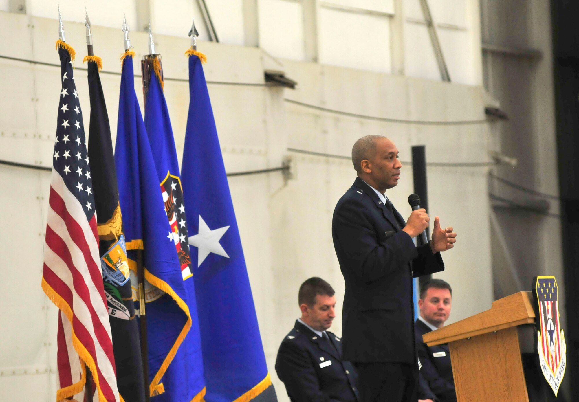 Col. Bryan Teff assumes command of the 110th Attack Wing, Battle Creek Air National Guard Base, Mich., Saturday, December 5, 2015 in the hangar of the Wing. Teff will be taking over the role of commander from Col. Ronald Wilson who has been the wing commander for three years. (Air National Guard Photo by Airman Tiffany Clark/released)