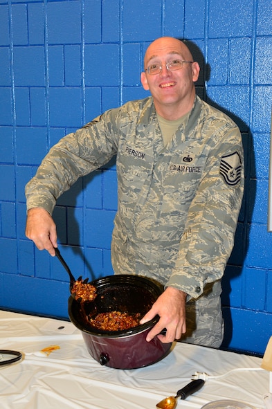 MCGHEE TYSON AIR NATIONAL GUARD BASE, Tenn. - Master Sgt. Don Pierson shows-off his winning chili entry at I.G. Brown Training and Education Center here, Dec. 2, 2015. The TEC held a chili cook-off as part of a series of fundraisers for the unit Holiday Party.(U.S. Air National Guard photo by Master Sgt. Jerry D. Harlan/Released)
