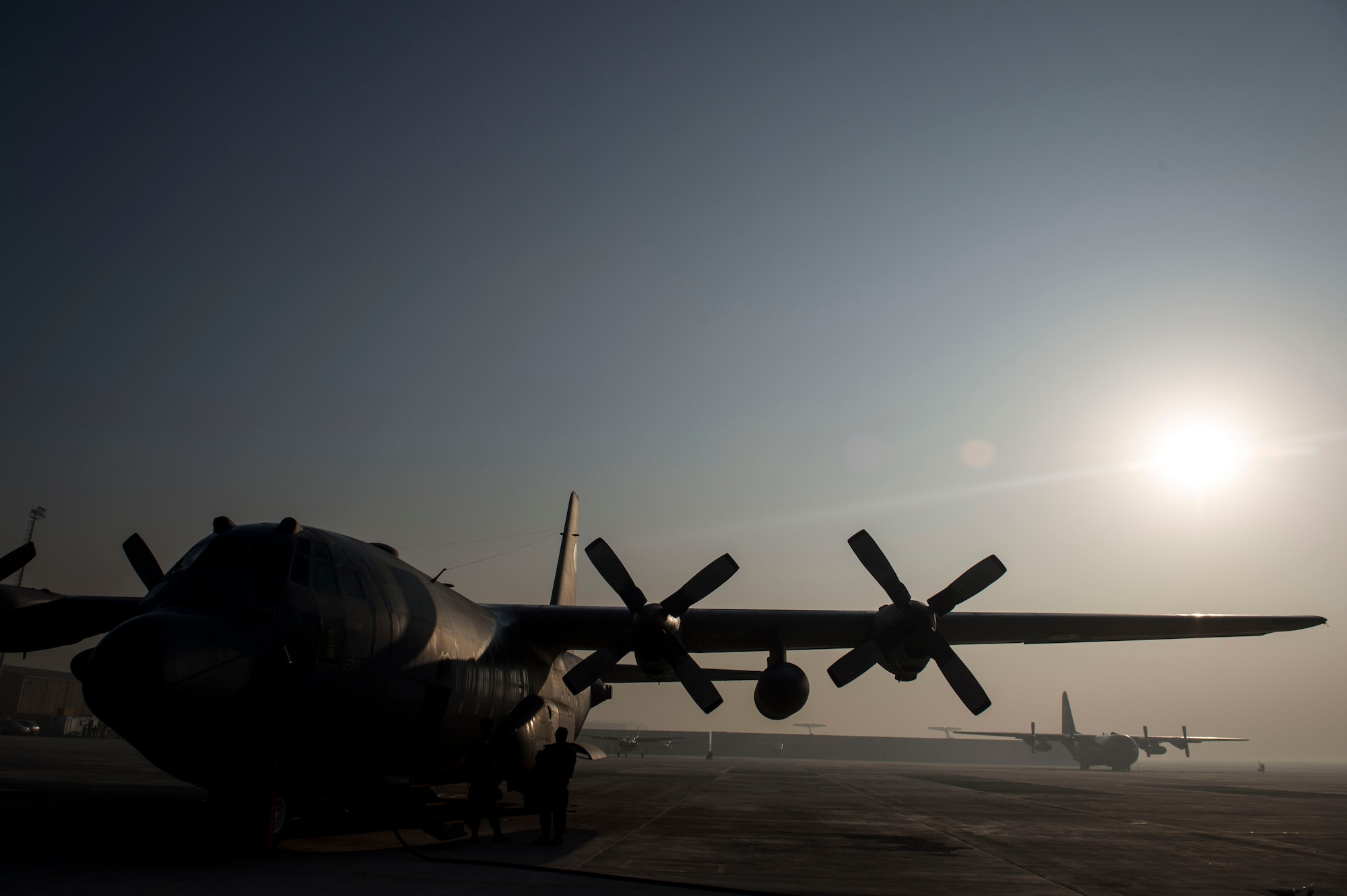 An Afghan Air Force C-130H Hercules sits on the flightline at Hamid Karzai International Airport, Kabul, Afghanistan, Dec. 6, 2015. The C-130 has a rich history of providing military airlift around the world.  Its short takeoff and landing capability makes it an optimum fit for Afghanistan’s rugged terrain. (U.S. Air Force photo by Staff Sgt. Corey Hook/Released)