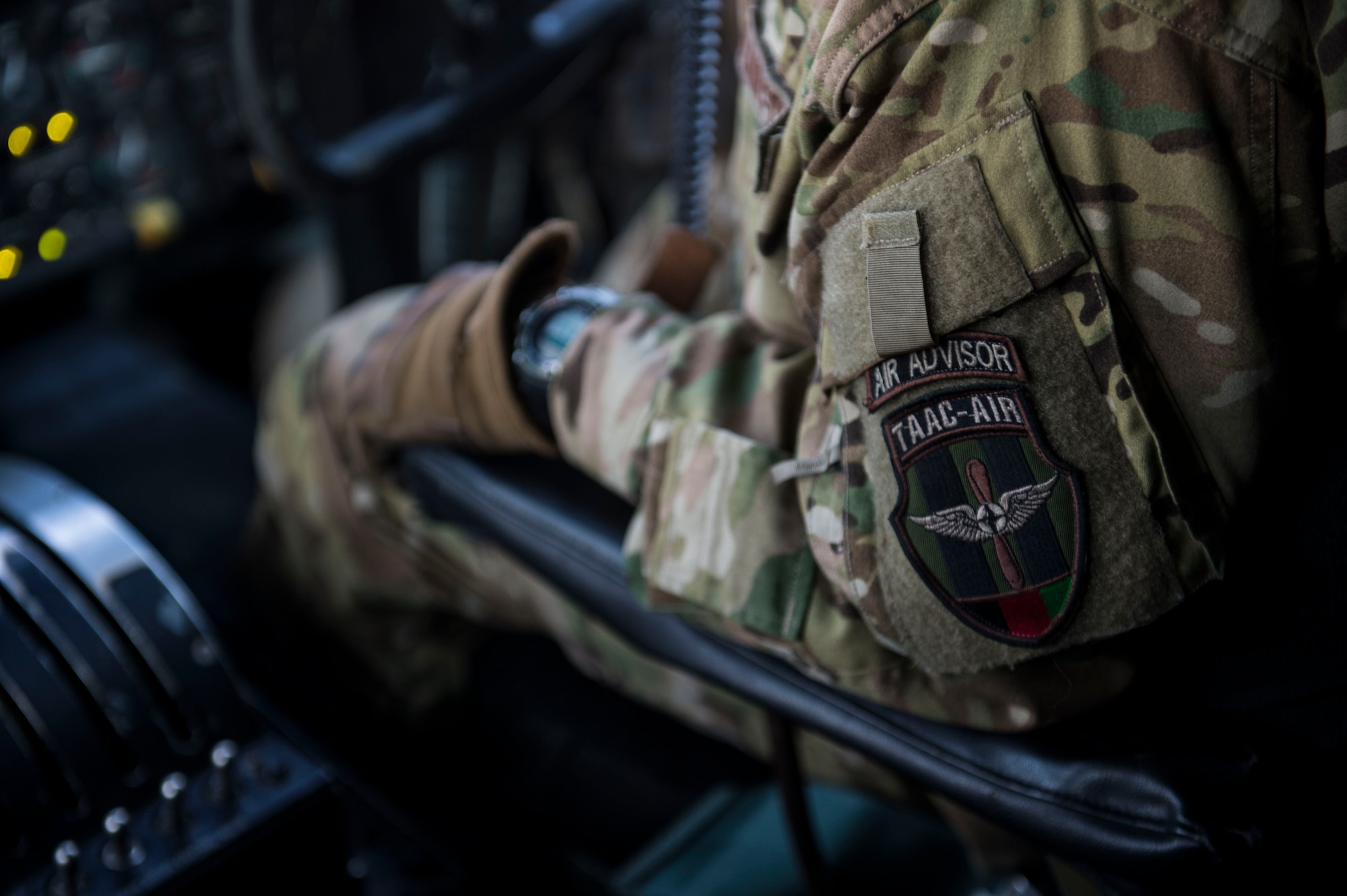 U.S Air Force Chief Master Sgt. Mike Delgiacco sits inside of a cockpit of a C-130H Hercules at Hamid Karzai International Airport, Kabul, Afghanistan, Dec. 6, 2015. Delgiacco’s mission is to train, advise, and assist our Afghan partners to develop a professional, capable, and sustainable Air Force.  (U.S. Air Force photo by Staff Sgt. Corey Hook/Released)