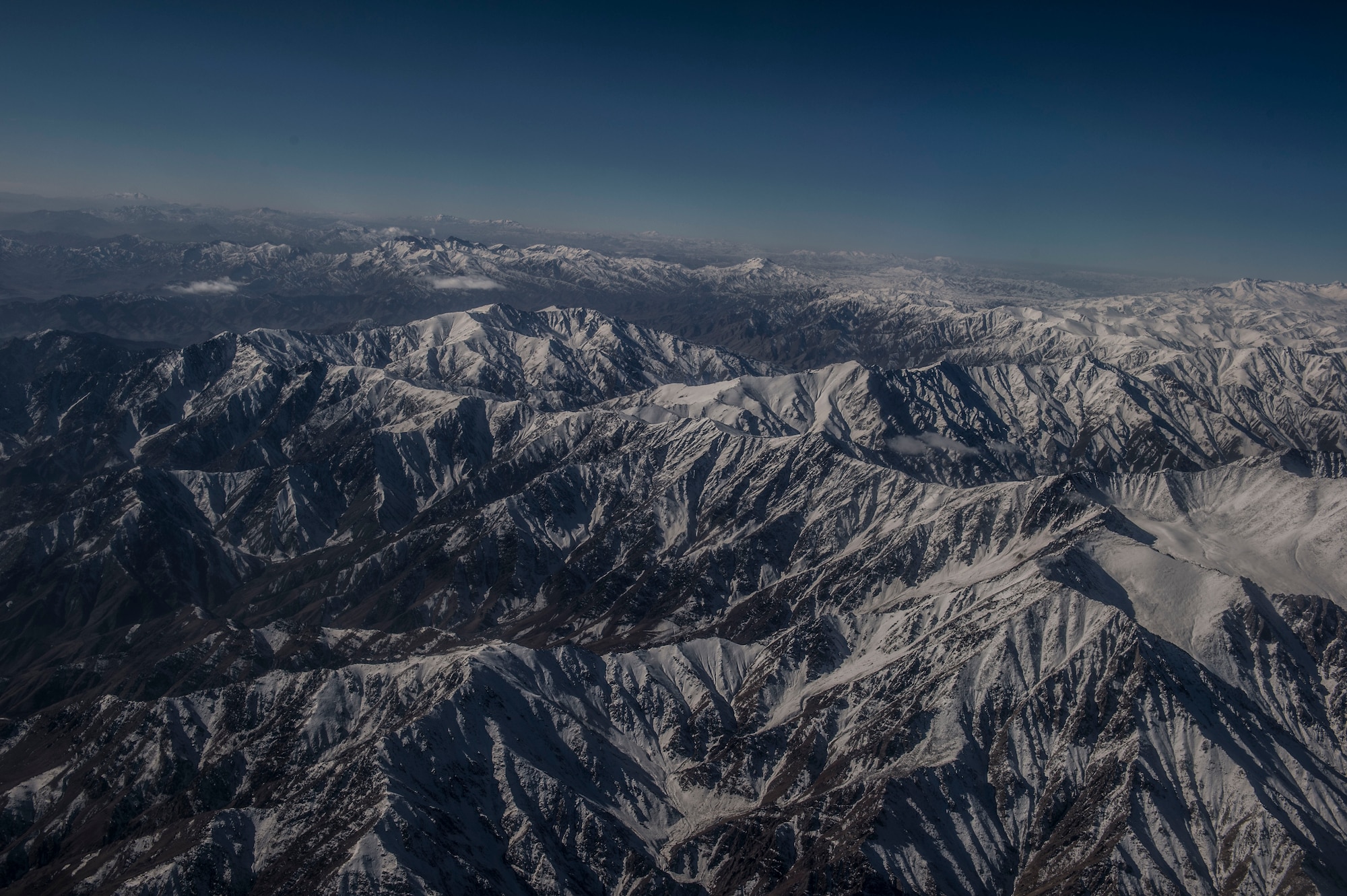 Mountains are covered with snow near Forward Operating Base Oqab, Kabul, Afghanistan, Dec. 6, 2015. (U.S. Air Force photo by Staff Sgt. Corey Hook/Released)