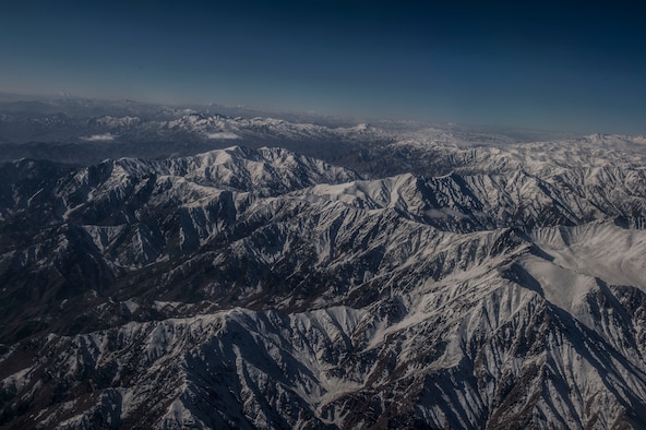Mountains are covered with snow near Forward Operating Base Oqab, Kabul, Afghanistan, Dec. 6, 2015. (U.S. Air Force photo by Staff Sgt. Corey Hook/Released)
