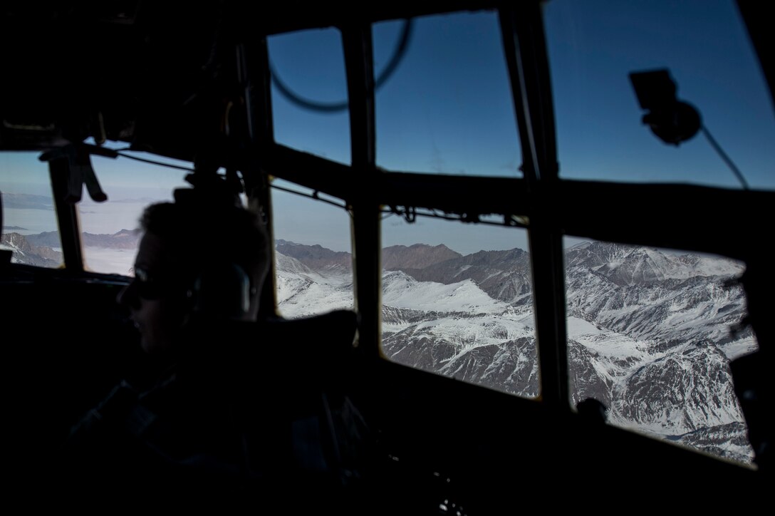 An Afghan Air Force C-130H Hercules flies near Kabul, Afghanistan, Dec. 6, 2015. The C-130 has a rich history of providing military airlift around the world.  Its short takeoff and landing capability makes it an optimum fit for Afghanistan’s rugged terrain. (U.S. Air Force photo by Staff Sgt. Corey Hook/Released)