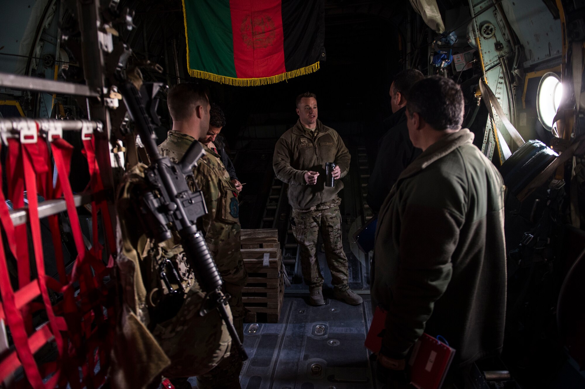 U.S. Air Force aircrew assigned to the Train, Advise, Assist Command-Air (TAAC-Air) and their Afghan counterparts conduct training on an Afghan Air Force C-130H Hercules at Hamid Karzai International Airport, Kabul, Afghanistan, Dec. 7, 2015. TAAC-Air advisors have grown the Afghan Air Force since 2006.  During this time, the Afghan Air Force has made daily strides toward becoming a professional, capable and sustainable Air Force. (U.S. Air Force photo by Staff Sgt. Corey Hook/Released)