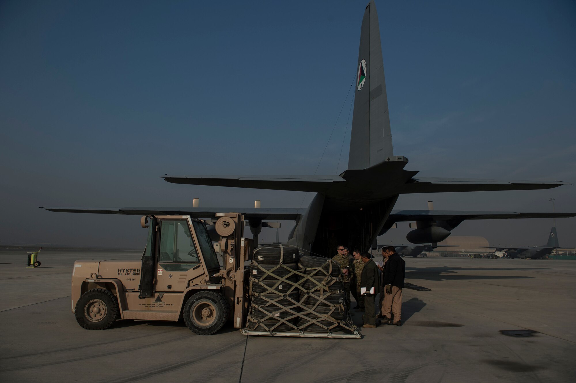 U.S. Air Force aircrew assigned to the Train, Advise, Assist Command-Air (TAAC-Air) and their Afghan counterparts conduct training on an Afghan Air Force C-130H Hercules at Hamid Karzai International Airport, Kabul, Afghanistan, Dec. 7, 2015. TAAC-Air advisors have grown the Afghan Air Force since 2006.  During this time, the Afghan Air Force has made daily strides toward becoming a professional, capable and sustainable Air Force. (U.S. Air Force photo by Staff Sgt. Corey Hook/Released)