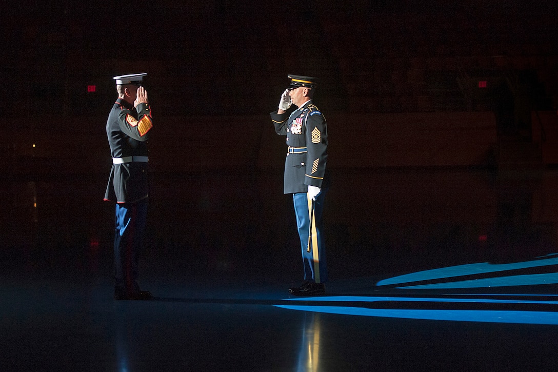 Marine Corps Sgt. Maj. Bryan B. Battaglia delivers a hand salute during his retirement and change of responsibility ceremony on Joint Base Myer-Henderson Hall, Va., Dec. 11, 2015. Battaglia served as the second senior enlisted advisor to the chairman of the Joint Chiefs of Staff from 2011 to 2015. Army Command Sgt. Maj. John W. Troxell became the third senior enlisted advisor ro the chairman during the ceremony. DoD Photo by Navy Petty Officer 2nd Class Dominique A. Pineiro