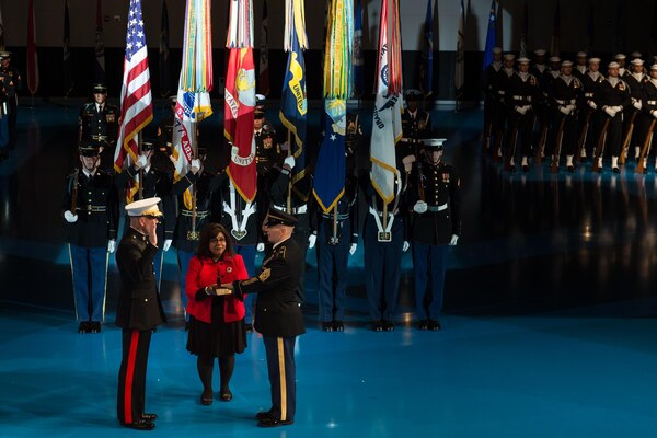 U.S. Marine Gen. Joseph F. Dunford Jr., chairman of the Joint Chiefs of Staff, swears in U.S. Army Command Sgt. Maj. John W. Troxell as the third Senior Enlisted Advisor to the Chairman of the Joint Chiefs of Staff during a change of responsibility ceremony in Conmy Hall on Joint Base Myer-Henderson Hall, Va., Dec. 11, 2015. Troxell most recently served as the senior enlisted advisor for U.S. Forces in Korea.